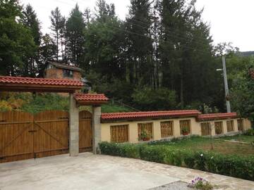 Фото номера Вилла с 4 спальнями Дома для отпуска Villa Nanevi г. Тетевен 44